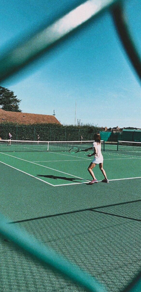 Tennis clinic on an outdoor court